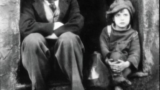 Charles Chaplin en Jackie Coogan in The Kid