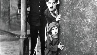 Charles Chaplin en Jackie Coogan in The Kid