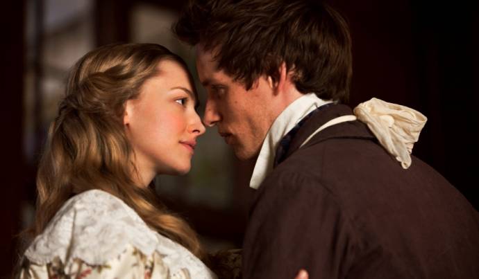 Amanda Seyfried (Cosette) en Eddie Redmayne (Marius)