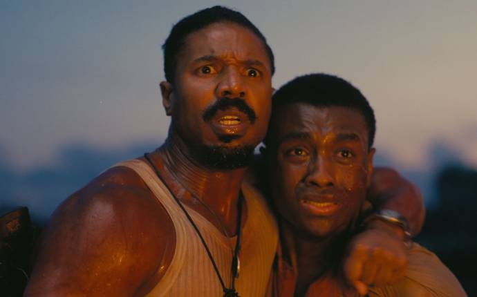 Michael B. Jordan (Smoke / Stack) en Miles Caton (Sammie Moore)