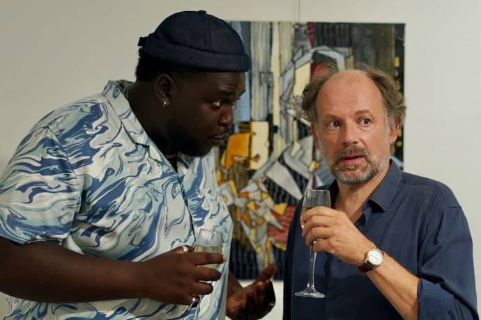 Salif Cissé (Baptiste Mendy) en Denis Podalydès (Pierre Chozène) in Le répondeur
