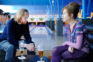 Jurgen Delnaet en Isabelle Huppert in Copacabana